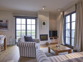 Reetland am Meer - Premium Reetdachvilla mit 2 Schlafzimmern, Sauna und Kamin E22